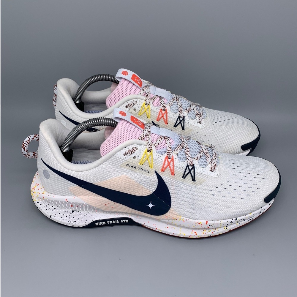 Nike White Trail Running Shoes with Navy Swoosh and Pink Accents
